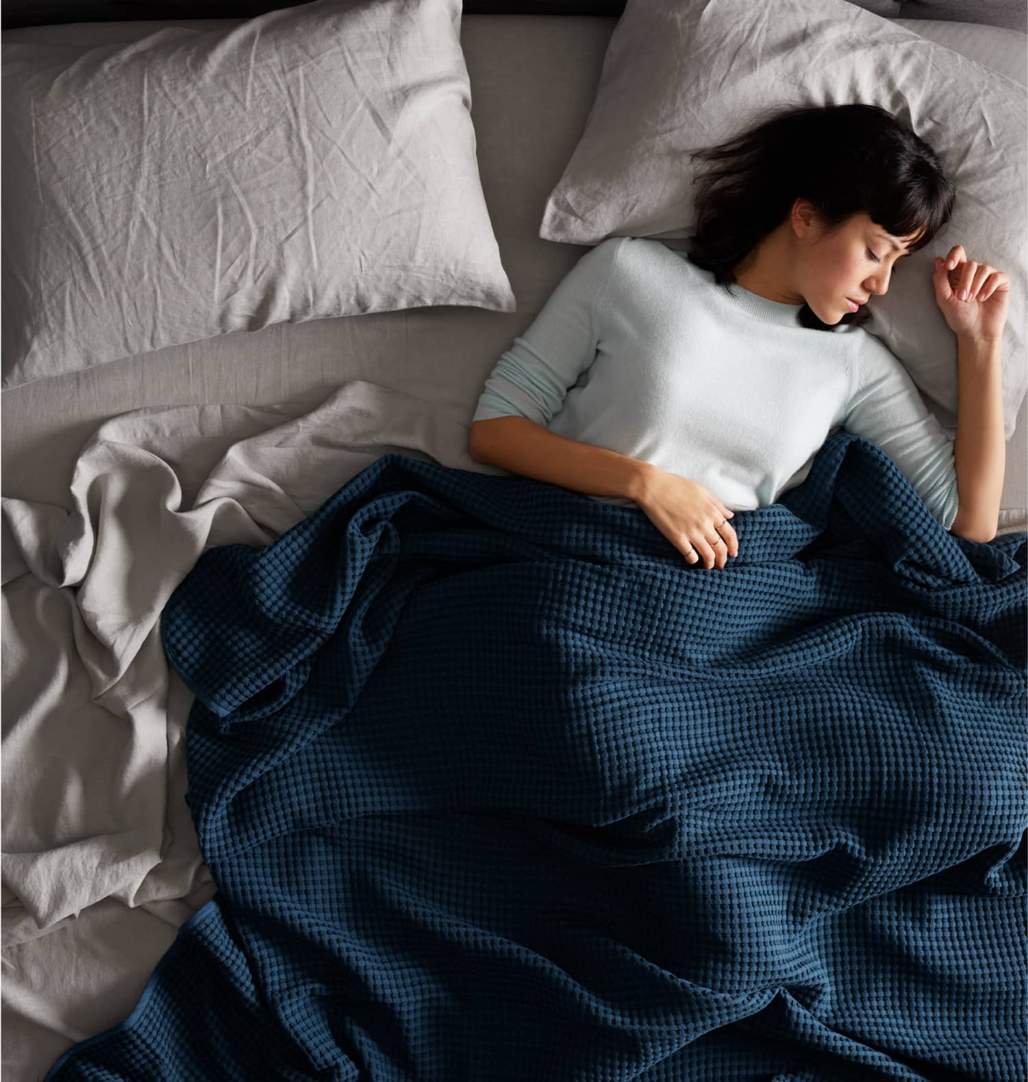 Woman sleeping on a Tempur-Pedic® mattress